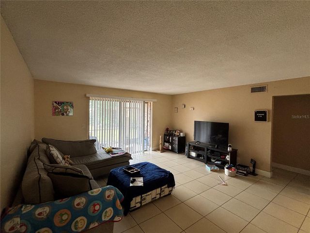 420 BANYON TREE CIRCLE 102, Maitland, FL 32751