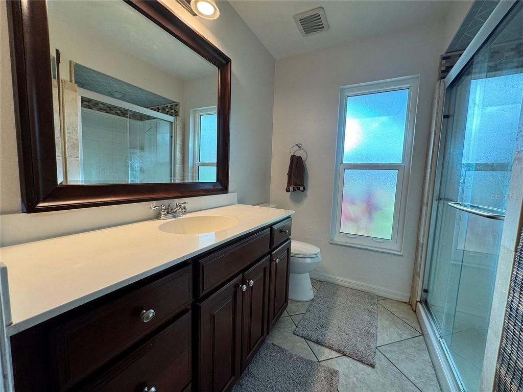 Image 16 of property listing at 4811 79TH AVENUE PLAZA E, Sarasota, FL 34243