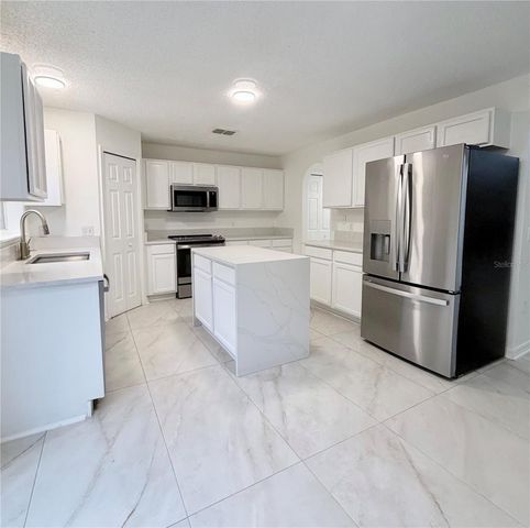 1637 MYRTLE LAKE AVENUE, Fruitland Park, FL 34731