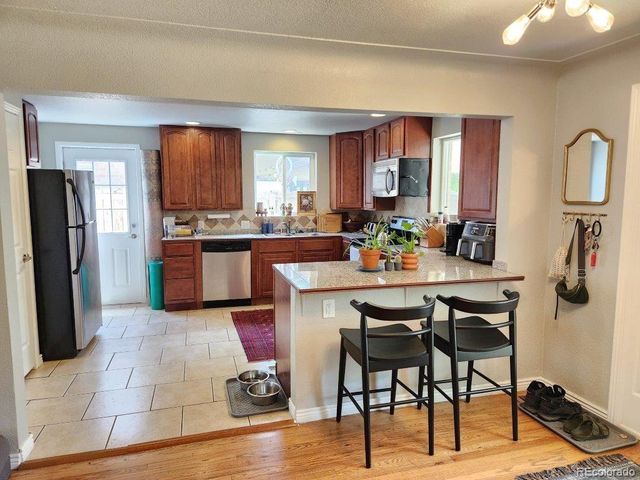 5520 E Thrill Place, Denver, CO 80207