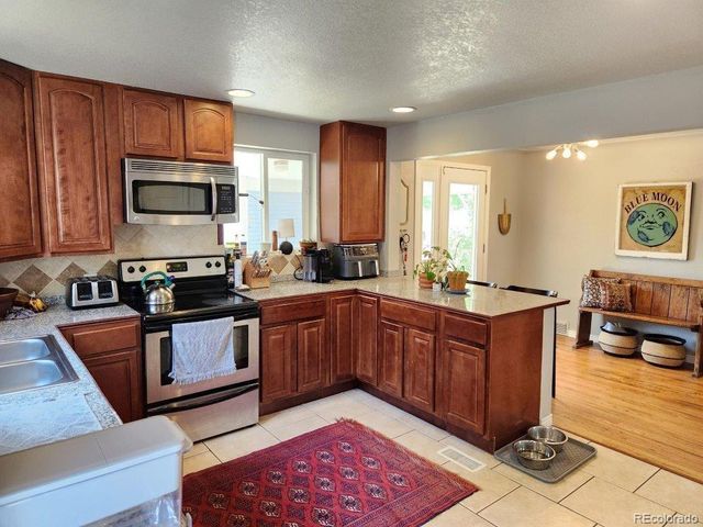 5520 E Thrill Place, Denver, CO 80207