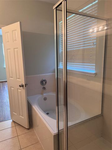 21003 Kirkland Woods Drive, Houston, TX 77095