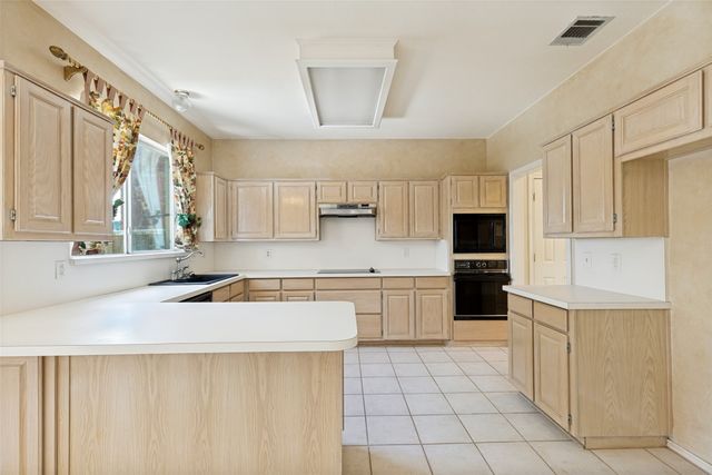 1109 Wild Cherry Drive, Carrollton, TX 75010