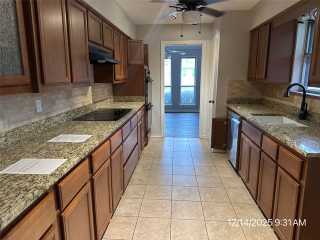 103 Red Bud Court, Oak Leaf, TX 75154