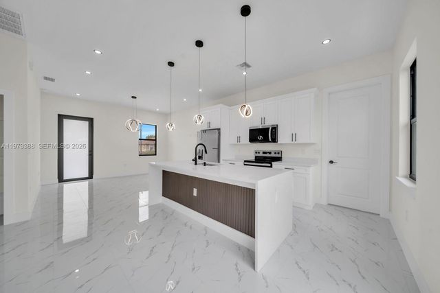 4003 10th ST SW, Lehigh Acres, FL 33976