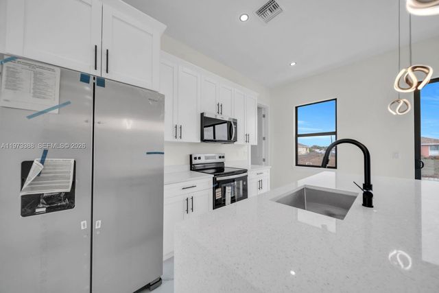 4003 10th ST SW, Lehigh Acres, FL 33976