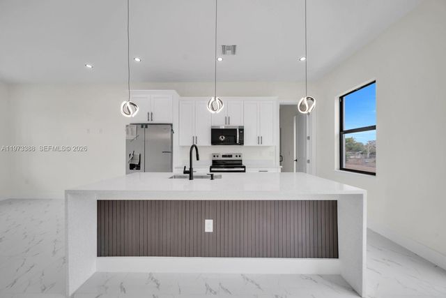 4003 10th ST SW, Lehigh Acres, FL 33976