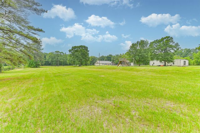 306 County Road 3997, Cleveland, TX 77328