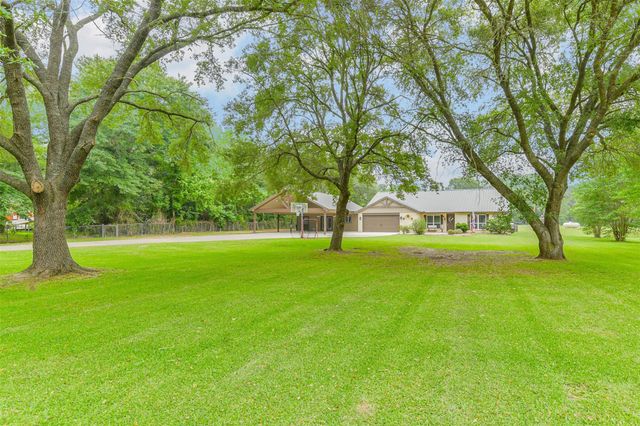 306 County Road 3997, Cleveland, TX 77328
