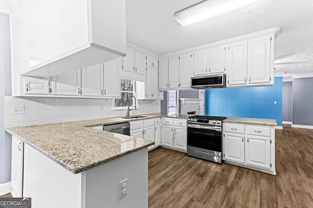 1394 Maple Drive, Lilburn, GA 30047