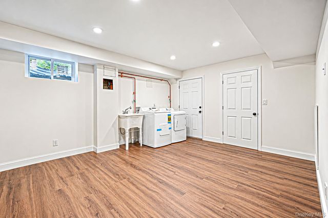 18 Woodridge Lane, Coram, NY 11727