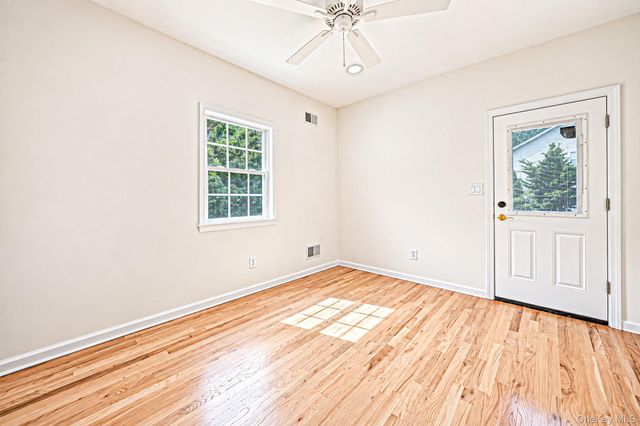 18 Woodridge Lane, Coram, NY 11727