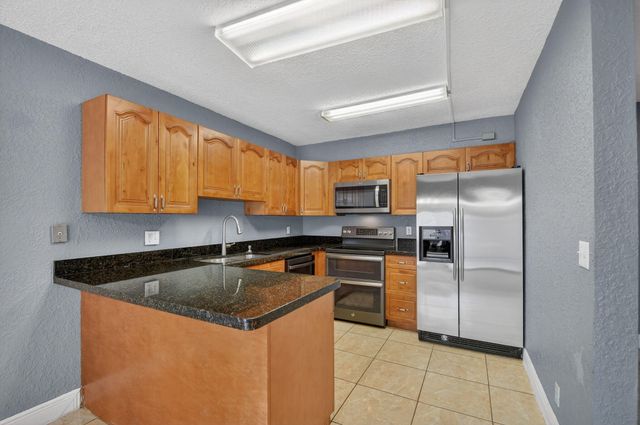 320 Woodland Road, Palm Springs, FL 33461