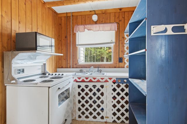 410 Golden Beach Drive, Kewadin, MI 49648