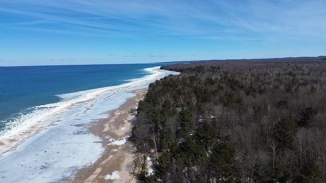 410 Golden Beach Drive, Kewadin, MI 49648