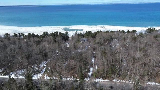 410 Golden Beach Drive, Kewadin, MI 49648