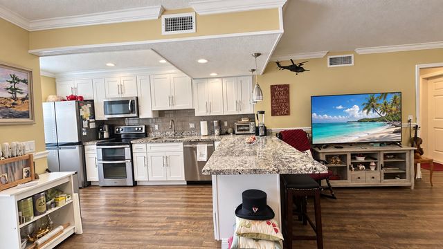 14 COLONIAL CLUB Drive 103, Boynton Beach, FL 33435