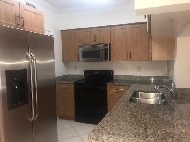 6410 Emerald Dunes Drive 205, West Palm Beach, FL 33411