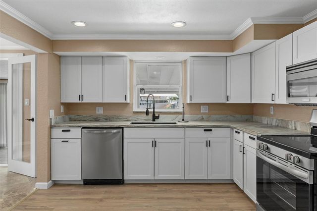 13804 MALCOLM AVENUE, Hudson, FL 34667