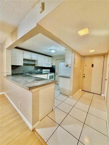 2320 S Cypress Bend Drive 206, Pompano Beach, FL 33069