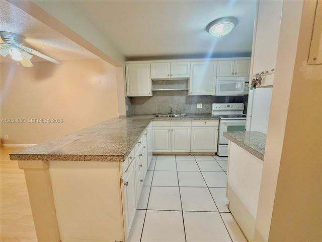 2320 S Cypress Bend Drive 206, Pompano Beach, FL 33069