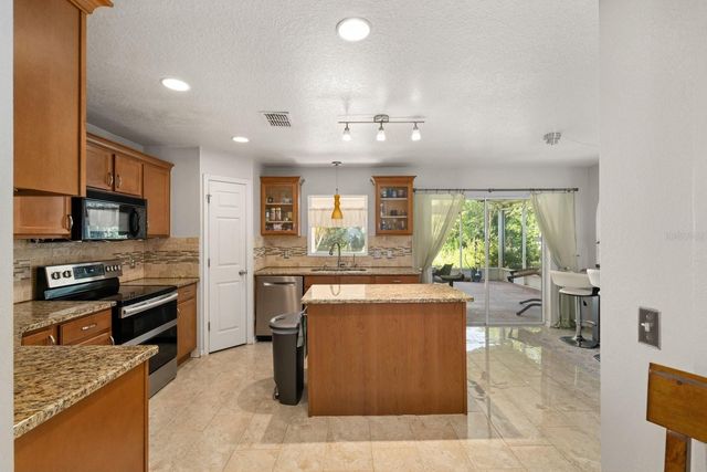 7651 LAKE ANDREA CIRCLE, Mount Dora, FL 32757