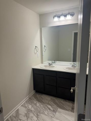 627 Addison Circle, Walled Lake, MI 48390