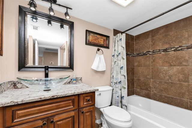 9050 MIDNIGHT PASS ROAD 1, Sarasota, FL 34242