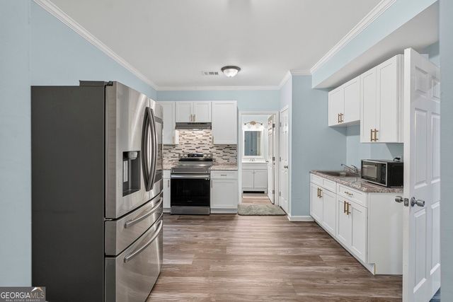 327 Round Pond Drive, Lilburn, GA 30047