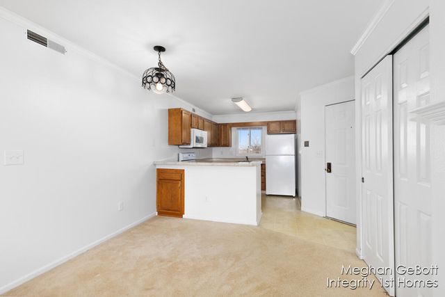 3280 Devonwood Hills Ne 6, Plainfield Twp, MI 49525