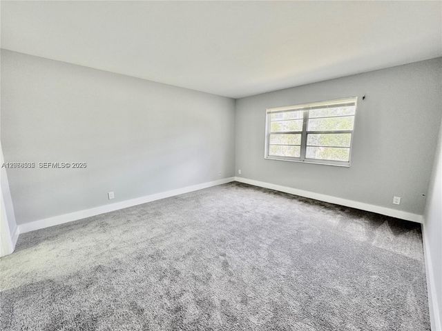 1075 Riverside Drive 302, Coral Springs, FL 33071