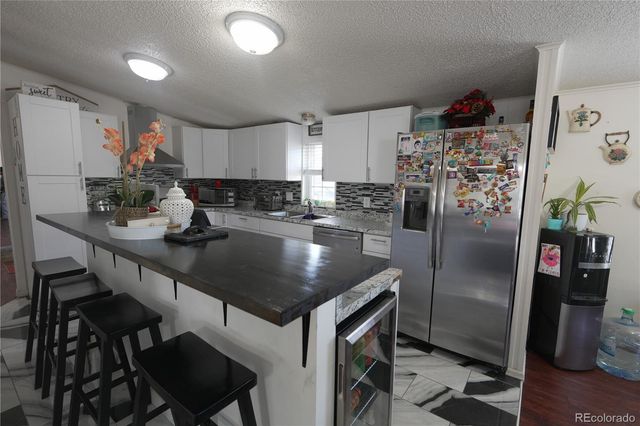 8391 Garfield Circle, Denver, CO 80229