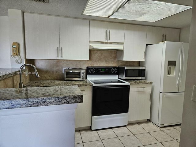 5011 Wiles Rd 306, Coconut Creek, FL 33073