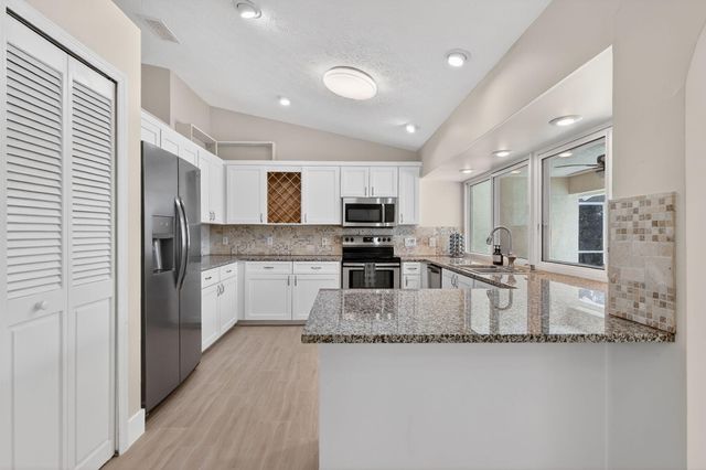 320 NE Surfside Avenue, Port St. Lucie, Port St Lucie, FL 34983