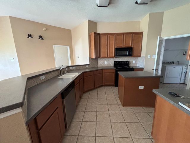 10715 Lyndon Meadows Drive, Houston, TX 77095