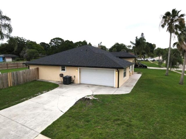 201 NE Faring Avenue, Port St. Lucie, FL 34983