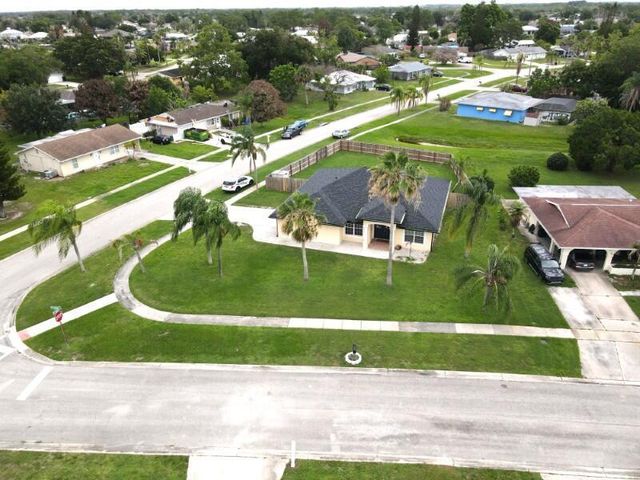 201 NE Faring Avenue, Port St. Lucie, FL 34983