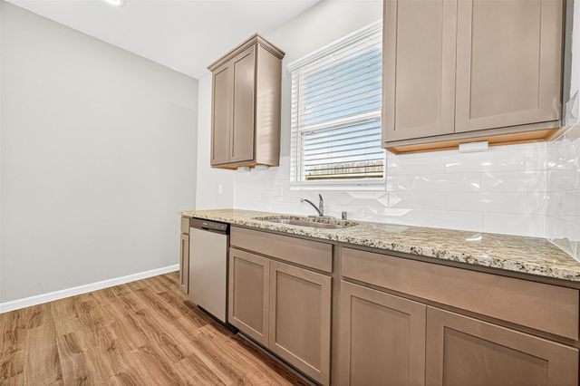 9987 Enclave Grove Drive, Willis, TX 77318