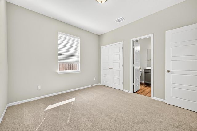9987 Enclave Grove Drive, Willis, TX 77318