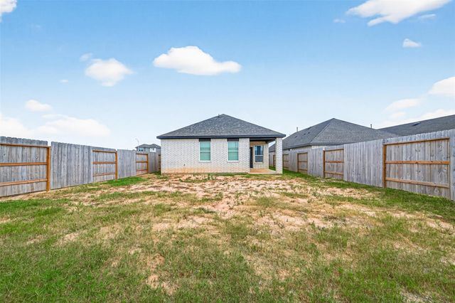 9987 Enclave Grove Drive, Willis, TX 77318