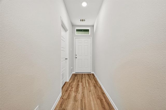9987 Enclave Grove Drive, Willis, TX 77318