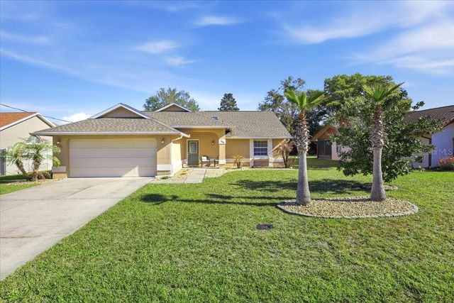 104 WESTROBIN LANE, Palm Coast, FL 32164