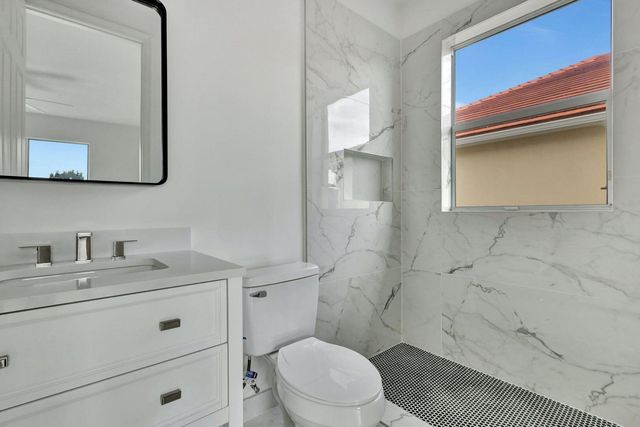 9334 Madewood Court, Royal Palm Beach, FL 33411