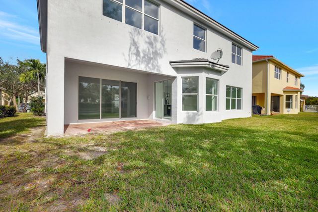 9334 Madewood Court, Royal Palm Beach, FL 33411