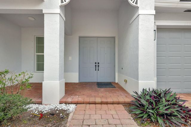 9334 Madewood Court, Royal Palm Beach, FL 33411