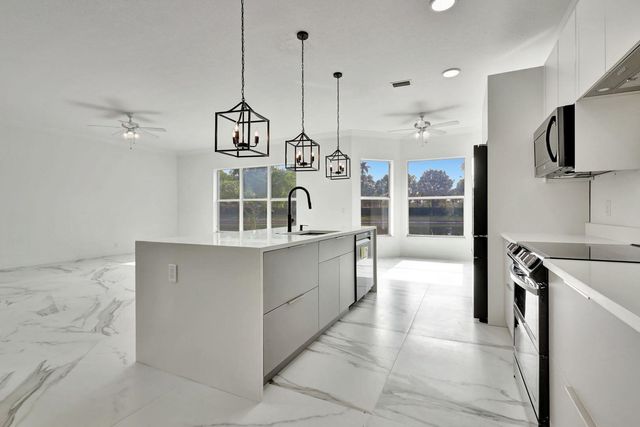9334 Madewood Court, Royal Palm Beach, FL 33411