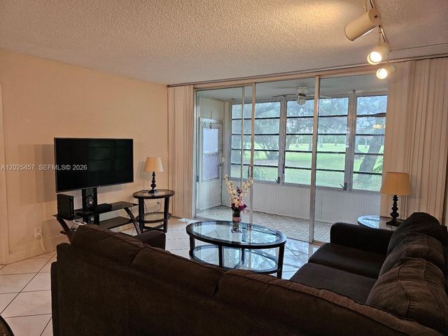 8380 Sands Point Boulevard J110, Tamarac, FL 33321
