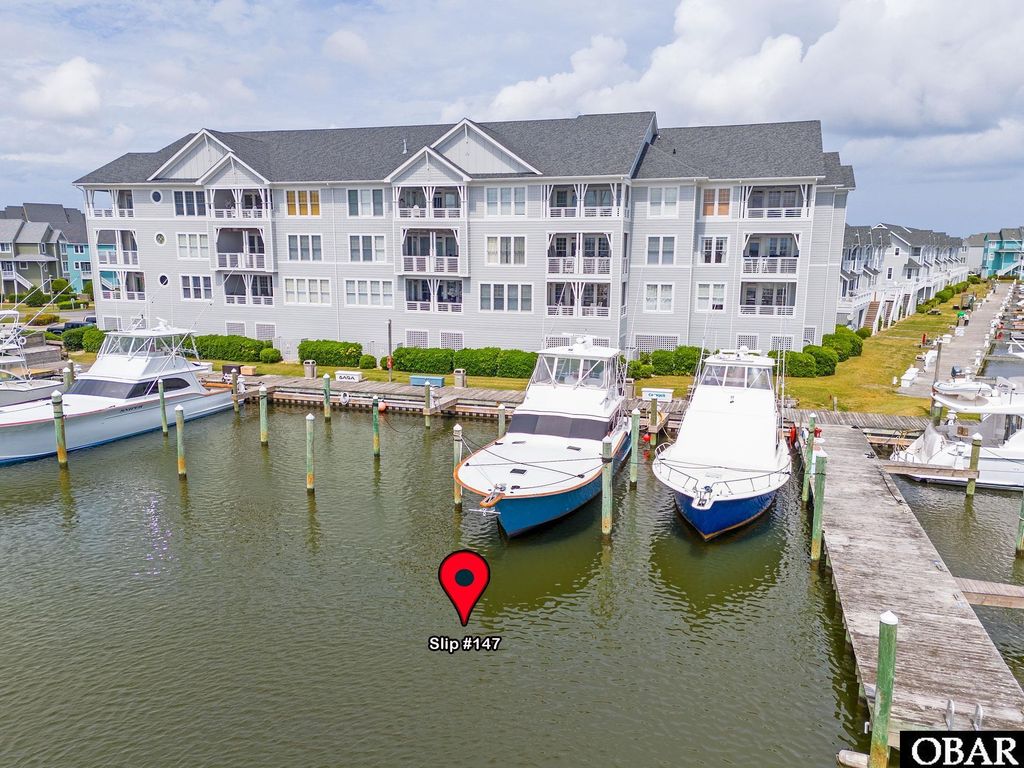 Image 1 of property listing at 147 Yacht Club Court Slip 147, Manteo, NC 27954