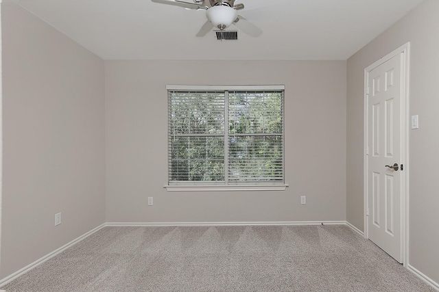 11 Scenic Brook Court, The Woodlands, TX 77382