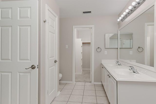 11 Scenic Brook Court, The Woodlands, TX 77382